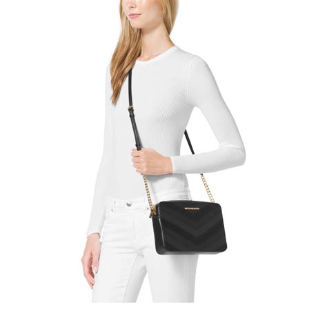 crossbody jet set michael kors|Michael Kors jetsetter crossbody.